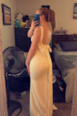I really liked the back of this dress and I was worried when I ordered it that it would look too plain however, it's amazing! I love that it's sophisticated and understated. It makes me look curvy and I feel so beautiful in it. It is definitely going to be my wedding dress!! - Ashlee B.