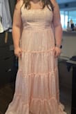 Beautiful material! The elastic back helps with any back bulge. Especially if you have a larger chest. It will look great after a few alterations. - Jillyn S.