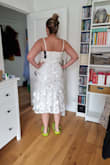 I felt that the very tight fit and the straight neckline made it less flattering on me. The green crocs are definitely the best part of the look. - Ana C.