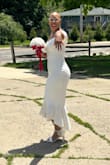 From the moment I put this dress on, I was in love with it! It hugged my arms, bust, waist, hips, and legs, perfectly! The material is firm with some stretchy give. I felt like a bride that was floating on cloud 9. I received a ton of compliments! - Yvette S.