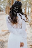 I chose this dress and I knew that I would make some changes to it. It arrived perfect, smooth and beautiful as it is, comfortable and perfect fabric. I added an addition of lace in the back and front and closed the neckline a little. Highly recommend. - Shosh L.