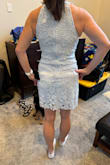 My husband and every friend I showed this dress to love it, but it fit weird on me. It was tighter on the hips than anywhere else, and I'm a 33D. The waist was loose in the front/back, yet puckered all the way around. If I went up a size so the lining could be pulled down more, it would be too big elsewhere. There's no give with this fabric, and I love the color. (ignore mess- we just moved!) - Elizabeth L.