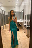 If you're not sure if you should get this dress - get it! :) I got so many compliments and I'm sure you will too! I'm the type of gal that always sticks with neutral colors. I had a wedding to attend, and for once, I wanted to wear a "fun" color. I'm so glad I found this dress! I'm really flat-chested (A cup) and felt really comfortable with this plunged neckline. I wore separate bra cup pasties from Amazon. That was a must for me! I bought a cropped fake fur brown jacket on Amazon since it's always chilly at night in the SF Bay Area. I also paired it with nude stilettos and a small black purse. This slit was perfect and actually helped me dance the night away. I held it up sometimes, and it was so fun doing that! I'm only 5'4, and with 3 inch heels, the dress sometimes got stuck under my shoes. The dress truly made me feel special, and I'm sure it will make you feel special too! :) I also tried on other Lulu dresses with no slits - but I kind of felt like a mummy. lol. This was the winner! - Pamela V.