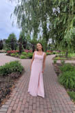 Lots of room for a larger bust and I could even wear a bra with it. The slit really added some flare to the dress. - Tristan V.