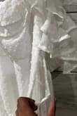 I loved this dress for my bridal shower. But halfway through my shower, I noticed the stitching on the side came apart. I'm glad there was a second layer, but was very disappointed in the quality. It was absolutely awful. [For] half of my photos, I tried to hide the one side. I'm an avid lulus buyer. I can't even wear this again casually. - Kanika M.