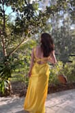 I love this dress! I got the straps altered slightly but it wasn't necessary, I just did it to make it a little more comfortable. Fabric was thick, nice quality, but I will say it was a pain to get wrinkles out. Overall very pleased with it. - Anna B.