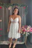 I absolutely loved this dress for my bridal shower. I got so many compliments on it. The only thing that I did not love about it was that it was tea-length. Personally, I thought the dress looked way better as a knee-length dress, and I had my aunt hem it for me. - Ana T.