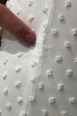 I ordered a size S. The dress fits perfectly and is beautiful, but the material is not great. The sides ripped. I noticed it when I got home after graduation. I wore the dress for only 5 hours. I would like to get a refund or exchange. I love the dress, but I am disappointed that it is damaged after the first use. I would like someone to contact me. Thanks. - Paula C.
