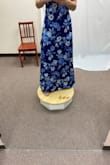 Beautiful dress! It was long on me even with 3-inch heels. I just had it hemmed up to fit my height and I love it. Light material. - Samantha P.