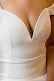 I got this dress as a last minute, because any of my options fit me. I was really scared because the fabric in the neck area have all the seems but it was good for my religious wedding and the pictures. - Alejandra C.