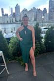I wore this to an outdoor wedding in NYC and it was stunning. The one thing I had to figure out is the top part when crossing the straps left a hole so you really cannot wear any type of bra, plus the back is open. The teal color is gorgeous and if you buy this dress I am sure you will get tons of compliments. - Kristy R.