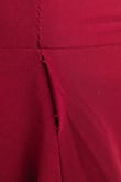 This dress fits true to size but is very long for me at 5'3. Even with 3 inch heels, it was still dragging on the floor and would require hemming. I love that you don't need to wear a bra. The dress came with a rip in the seam, and there were dark spots on many areas of the fabric. Quality control was seriously lacking with this one. I would have kept it and made the alterations, but it has to go back. - SALINA S.
