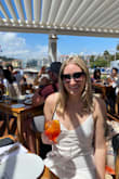 Bought this dress for my honeymoon to the French Riviera, and it was perfect! So comfortable, so flattering, and fit right in with the coastal-chic aesthetic. The dress is form-fitting without clinging too much, and the front flap detail hides any insecurity you have in that front area. The back tie detail is feminine and shows a sexy yet tasteful amount of back. I found it to be true to size, and the elastic at the waist makes it a very comfortable wear. Very cute dress and will be wearing again soon! - Amy L.