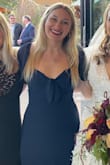 Bought this for a wedding, and it was wonderful! Fit snug on the body, but in a comfortable and flattering way. Such a flirty and feminine dress, and the navy was a lovely color. The slit added a touch of sexy, but it wasn't too high and was tasteful for the occasion. I'm not as tall as the model, and the length was still good on me for a cocktail affair if I wore heels. Definitely recommend! - Amy L.