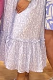 This dress was absolutely stunning the color is so beautiful and fit perfectly, it's a little on the heavier side but not uncomfortable. I got so many compliments! - Flor A.