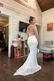 I was worried this would not look amazing in the belly area, but with some shapewear it was fine. If it didn't have a train, I think it would be too casual for a wedding dress. (We are having a simple, backyard wedding.) Out of the three I tried on, this is the one I chose. It's light weight, breathable, and does wonders for the booty. I'd say at least try it on if you're like me and a little curvier. I was hesitant but ultimately happy I chose it. - Tiffany E.