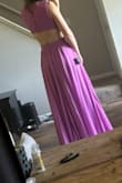 Great fabric and fits true to size - I feel like a princess in it! I have tiny boobs and the Medium fit my athletic build without gaping in the bust area. Very accommodating for a tiny waist, muscular back/upper body, and small chest! If I really wanted to wear a small I could, but since the material doesn't have any give breathing and dancing would be uncomfortable. The length is a bit long, too. I'm tall and it's long for me. 3-6" heels would help you avoid tripping on the hem. - Carly W.