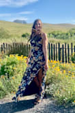 I had so much fun wearing this dress to a wedding. I knew I wanted to wear a floral dress, and I am so happy I decided on this one. I used the fit finder and it recommended a size medium for me. It fits perfectly! It was really long though. I am 5'5 so I had to get a few inches taken off the bottom. - Amy B.