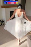 This dress was stunning, very well made; Princess-like feel to it. The material is delicate, flowy and has a gorgeous subtle shine to it. 
It totally made me feel stunning and elegant. Being a Grandmother for the 1st time is extremely important to me and I wanted to look and feel fabulous! This dress surely did the job! This isn't the first time I buy from Lulus. Lulus never disappoints it comes to buying the perfect dress for any occasion! Highly recommend Lulus!! - Elizabeth G.