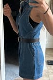 I've been wanting a jean-romper or short jean dress for this summer, this one won the contest because It had the collared neck plus belt loops so I'm able to wear my waist belts. It is very comfortable and flattering, goes great with white tennis shoes or heeled sandals. The only part of this great, well-constructed dress is under the arms it dips low so you can see your bra if that's all you have under it. I have a D-size chest so it would be pretty uncomfortable without, so that's the only thing I would change. - Carley J.