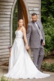 I never ever write reviews for anything. But this dress is simply stunning!! I looked and looked for a wedding dress that wasn't ridiculously expensive. When I came across this one, I was very skeptical, especially because it was on sale for $280 compared to the $1500+ dresses I was looking at. I figured for the price, I could at least try it on...and fell in LOVE with it. I purchased the jeweled belt from Lulus too and had them sew it on. I needed a few alterations to make it fit perfectly and it ended up being gorgeous and looking like a dress that costs thousands of dollars. No regrets, buy this!! - Jennifer G.