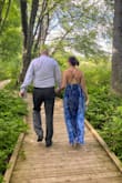 I love this dress. It was flowy and comfortable. It does require some ironing to get the skirt pleats flat and I have a small bust, so I taped, but felt comfortable the whole time and received many compliments. It's quite long, which was a plus for me being a tall woman who likes to wear heels. Highly recommend! - Darrah B.