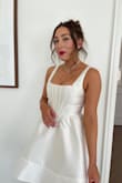 I was obsessed with this and so was everyone else! I purposely ordered a small so it would be a tight fit in my chest. It was a little too tight but I didn't mind since I was only wearing it for a little bit. But highly recommend! - Dominique M.