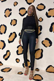 Very sexy leopard bodysuit. I wore it with some black pleather leggings. - Trineice C.