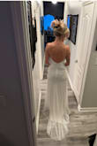 This dress was beautiful. I ordered an xs first and it fit but I was afraid it might be a little snug in the middle so I ordered the small. The cup size was too big, I had it taken in where I could but couldn't do enough because of the sequins. It was still a little too big and I had to use double-sided tape on the sides of cups. It did look gorgeous. Some sequins do fall off when you wear it. The back is absolutely stunning. - Holly D.