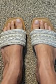 I'm normally a true womens size 9, and these are a smidge large on me. I will keep them and just like the top with moleskin, which will help with the stiffness too. Very pretty shoes! - Alisha C.