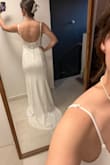 I knew it when I saw it! The fabric is thick, and it's not see through. I was worried about that because I had that problem with other dresses I tried. The stitches are great quality. I'm just going to fix the length of the straps to my size and that's it. - Andrea D.
