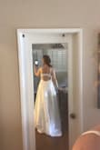 I really liked this dress. I bought Lulus rhinestone belt which added the perfect bling. I liked the adjustable straps and the overall fit. I'm 22 weeks pregnant and the fit felt good at my belly. - Kristen S.