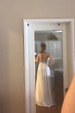 Love at first-sight! The detailed beading is amazing and the chiffon dress is flowy. So affordable for the quality of the dress. The top is a bit heavy bc of the beading so I'm having the straps taken up. I'm 21 weeks pregnant so my bump will show. There is a non-stretchy under layer that initially was a bit snug on my hips and belly but a seamstress can add panels to the sides for more room. This is the one!!! - Kristen S.