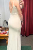 I LOVE this dress! When I bought it, it was a final sale offer (I.e., no returns) for $50. Because it was so cheap, I figured it was worth the risk, and it was my favorite dress I tried on! The front is nice, but the back is what really stands out. I love the low-back design with buttons and the lace panel. The dress is super comfy, and it already fit really well, but I did get it altered to take up the length, take in the top a little, and shorten the straps. I also had bra pads sewn in. - Tara N.