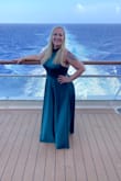 I bought this to wear for formal night on a Caribbean cruise. It was a beautiful fabric and color. I had to get it hemmed by at least 8 inches though because it was soooo long for my 5'5" self. I paid more for the tailoring than the dress but it was worth it. - Rebecca M.
