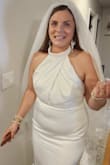 About 3 weeks before my wedding I decided I needed a new dress. I used the Lulus online chat to have a stylist help me pick several options. My bridesmaids sort of convinced me that this was the one, and it was, it truly was. I felt BEAUTIFUL. It went with the vibe of our wedding and styling it was so much fun. I was planning to change mid-way into a different outfit but loved this so much I kept it on all night long. I decided to wear no shapewear or bra, and I still felt very comfortable in it. I felt like this dress was made for me. The material was so soft and luxurious. I opted not to have a bustle put in bc the train looked gorgeous and was just short enough to maneuver in. Thank you for helping me find my dream dress! - Nicole E.