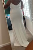 Stretchy material and easy to move in. Bought this as a reception dress! - Sharon W.