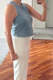 Loved the top from the pics. Weird fit though. The way the top fits and the relief lines on the sides make the chest area look very low. The side view shows the shirt is not fitted and hangs way off of your body. Will be retuning. It's sad Lulus charges $2 for trying clothes on now. - Kristen M.