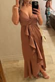 Super comfortable - I wasn't sure about the ruffles in front at first. They didn't hang like they do in the picture, but once I ironed it looked perfect. I [got] so many compliments and the color looked great with a tan. I would absolutely wear this again! - Jillian S.