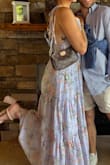 I wore this dress to a garden party-themed outing. It was perfect! I wore it in the heat of summer and it provided plenty of airflow, I wasn't sweating excessively. The tie straps make the bust more adjustable. I'm pretty flat-chested & the inner corners of the bust almost had a nip slip a few times. Overall, it was fine & looked great in pictures. - Jessica L.