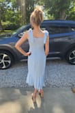 Hey all you Lulu's girls! Tell your moms they can wear pretty, flirty dresses, too! I'm 54! I ordered this for a wedding and received the dress today. It fits perfectly and the tie straps tighten or loosen the bodice according to your needs. I won't need a bra with this, but I will probably use a little tape for security of mind if I end up choosing this dress (I have another one to try on the way). This is the third Lulu's dress I have ordered and even though I returned the other two, they were both beautiful. The only slight downside I've noticed about the 3 dresses is that the fabric in each had no give. It's pretty tight around the rib cage on me. And unless you have a very flat belly, you'll need shapewear. Hope to see some "women of a certain age" defying the standards by wearing Lulu's >p - Shannon W.