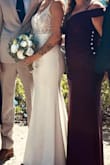 This was my wedding dress and I loved how it made me look and feel. Had it altered to have the cups be skin color because I didn't like the starkness of the white cups. So happy with my purchase. Felt very high quality. - Kaeli P.