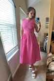 I wore this dress to my friend's bridal shower and I got a lot of compliments on it! I was a little nervous about how the cutouts would lay, but I think it looked good! The material around the waist does not have much stretch so it definitely fits somewhat snug. I usually wear a small, which is the size I ordered, but sometimes need to size up to a medium depending on the fit. Overall, I would recommend! - Kelli D.