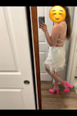 So excited to wear this for my Bach party! It's mostly white with a little pink. The small would have been too tight but the medium lays and fits just right. I'm a 34B/C. - Alexandra S.