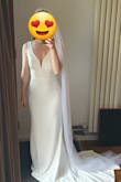 Unexpectedly, I found my wedding dress! I was looking for something simple and elegant, but wedding shops offer tons of laces with prices ranging from 800 to 4000 euros. I ordered here from sheer desperation. I was shocked it arrived in the Netherlands over the weekend (I paid for air delivery), and it fits perfectly. Material is stretchy. I still need to shorten the length, but that was expected (I'm only 160cm on heels). The only downside I'd like to note is that the textile, although heavy, is a bit transparent. You can see the seams well, and it gives a cheap feeling. It is also great for girls with small breasts. I'm size 75B. Yes, it could do with some inbuilt pudding but is also good to go without. A metal bone at the chest was off but my tailor put it right. He also needed to make a netting at the back tighter, because, as many mentioned here, it was sticking out (but not drastically). Anyhow, I'm satisfied, and thank you Lulus for your great customer support! - Irina B.