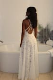 This dress is so beautiful and comfortable!! Wore it to my wedding in Las Vegas, and I had so many compliments about how elegant and sexy it looked. To all the brides thinking of buying this dress, please do not hesitate!  You will not regret your purchase. - Angela U.