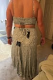 Got it for my honeymoon to Hawaii and it's perfect!!! The skirt is a wrap style so I love that I can make it fit perfectly, and the top is so comfortable with the elastic back!! I feel like my bust is perfect. I think a B to C cup is ideal as it fills the cups perfectly but doesn't require a bunch of support. (Top straps are adjustable) The material is perfect! Not too thin or too thick. Highly recommend ordering!! As a tall and slightly large girl, the large size was perfect. - Marci J.