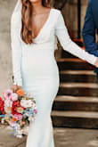 I ordered this dress for my elopement ceremony. It was absolutely stunning! I'm small and lean, and the shoulders and bust in XS size were too big for me. Nothing a little tailoring couldn't fix! We took some material off of the train and used it for a bow in the back, which held the back/shoulders together since they were sliding off. The sleeves were also a little long for me, but overall I'm absolutely in love with this dress! - Morgan A.
