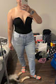 I ordered this body suit in an xl, and I wasn't sure if that would be too big or too small. Lulus tends to run a little big sometimes. I believe I am a true xl in most items: top or bottoms. I got this in xl and it fits perfectly! If I sized down it would be too tight or short on the torso. I love how it can be dressy or casual! The V does kind of stick out at the bottom but it's not a dealbreaker. Def will get some fashion tape so I don't accidentally give a free show! - Adrienne S.