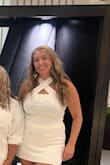I want this in all colors. It's a great material, has a little stretch, and is so flattering. I love the crisscross around the neck, makes a simple top look sexy. - Jenna Y.